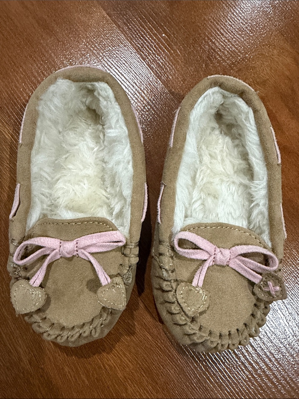 Cozy Suede Moccasin Slippers in Light Brown with Pink Bow